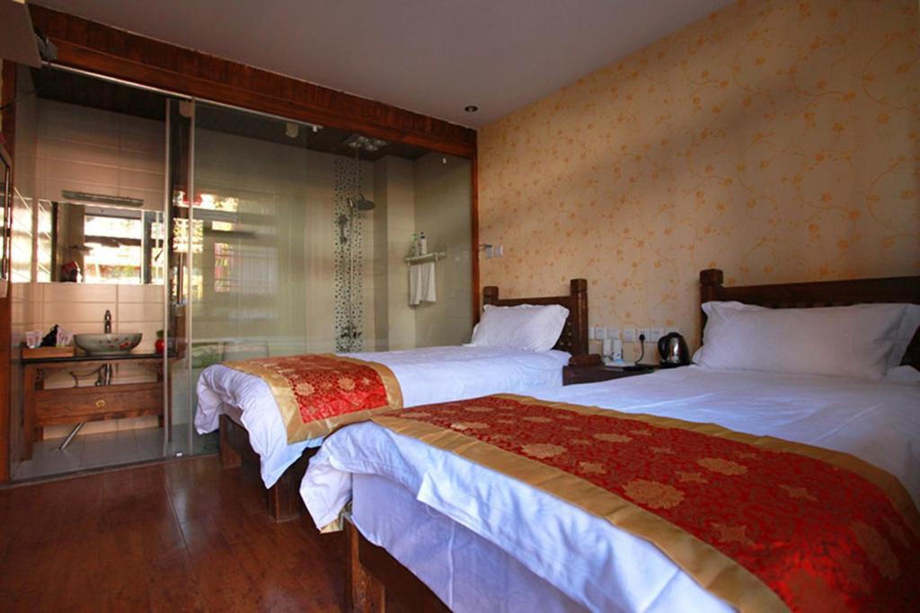 Lijiang Hyhy Inn Rom bilde