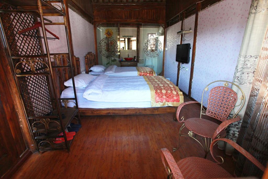 Lijiang Hyhy Inn Rom bilde